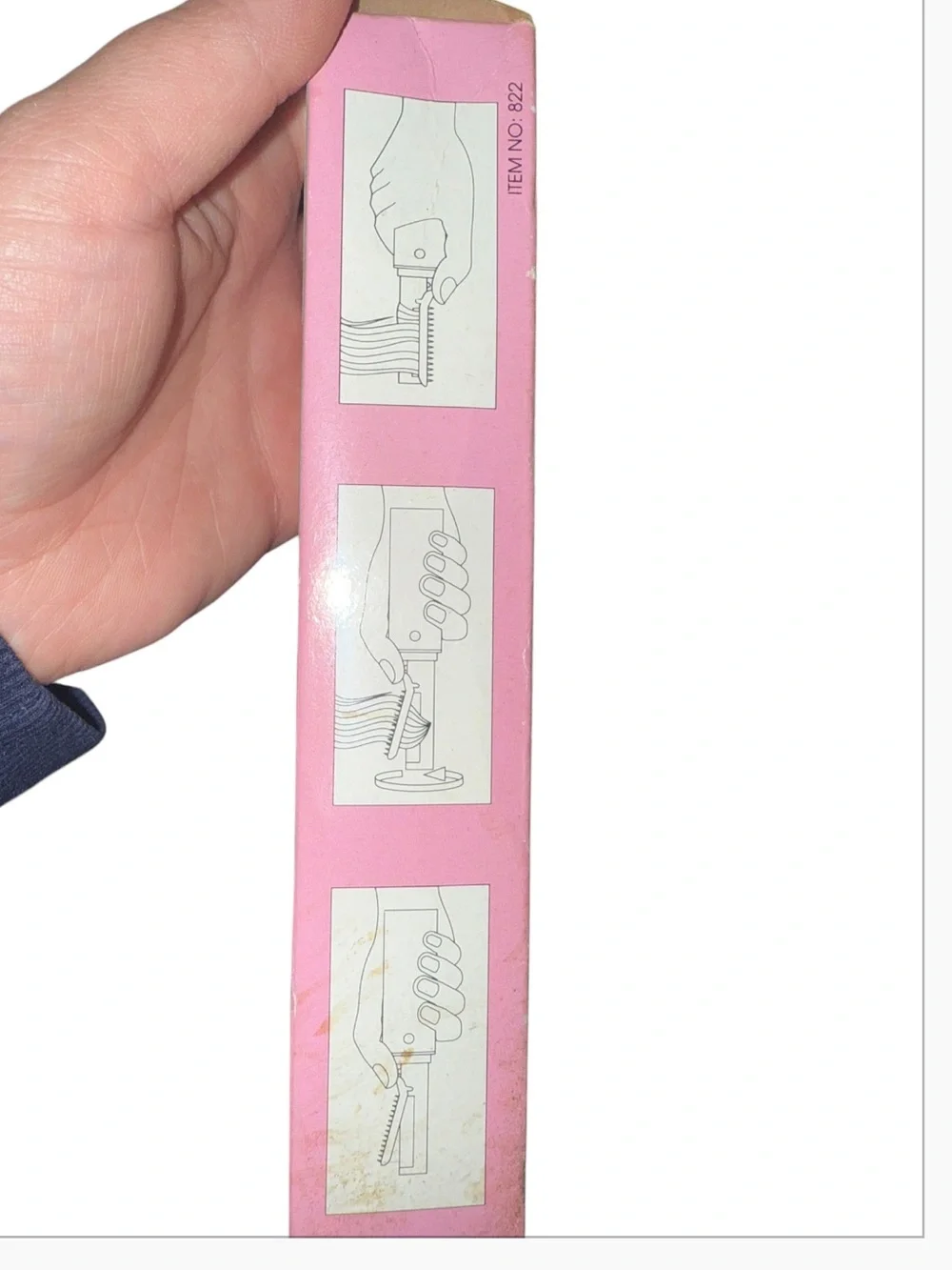 Vintage pink, portable battery-operated cordless hair curler and styling brush d